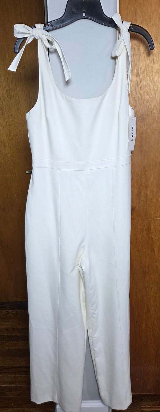 Likely White Sleeveless Wide Leg Jumpsuit with Bow Tie Straps